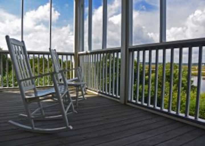 An enclosed deck adds privacy to a Asheville property.